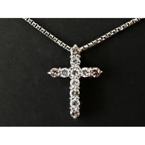 128 - 18kt White Gold Chain with 18kt White Gold Cross set with 7 round brilliant cut diamonds (0.34ct) an... 