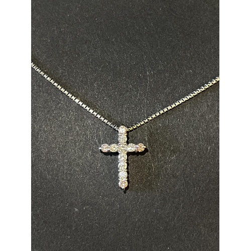 128 - 18kt White Gold Chain with 18kt White Gold Cross set with 7 round brilliant cut diamonds (0.34ct) an... 