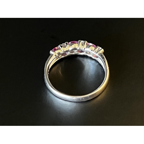 139 - Platinum Pt 900 Ring set with 6 White round brilliant cut Diamonds and 6 larger oval cut Pink Sapphi... 