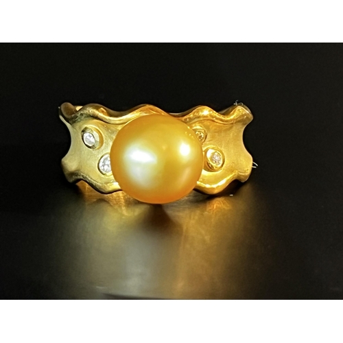 143 - 18kt Gold Diamond and Yellow South Sea Pearl (semi Baroque) Ring featuring large 11mm South Sea Gold... 