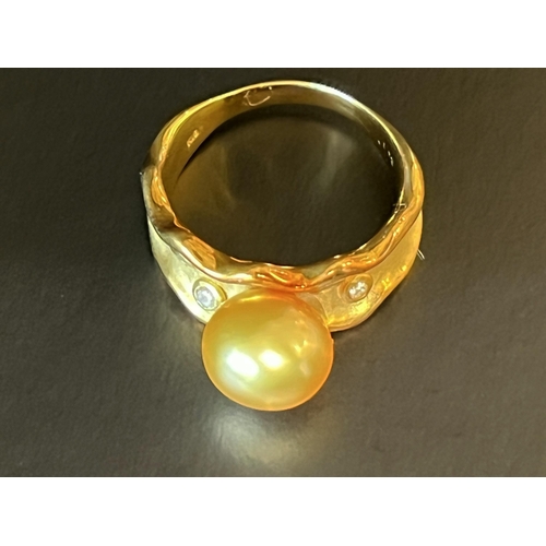 143 - 18kt Gold Diamond and Yellow South Sea Pearl (semi Baroque) Ring featuring large 11mm South Sea Gold... 