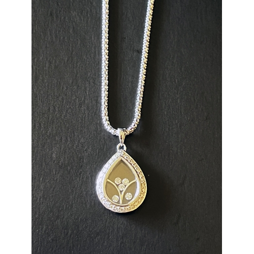 153 - 18kt Italian White Gold Chain and Happy Style Diamond Teardrop Pendant featuring 3 small round brill... 