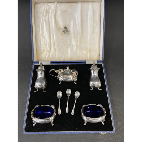 12A - Vintage presentation cased Hardy Bros sterling silver cruet set, (please note one spoon is silver pl... 