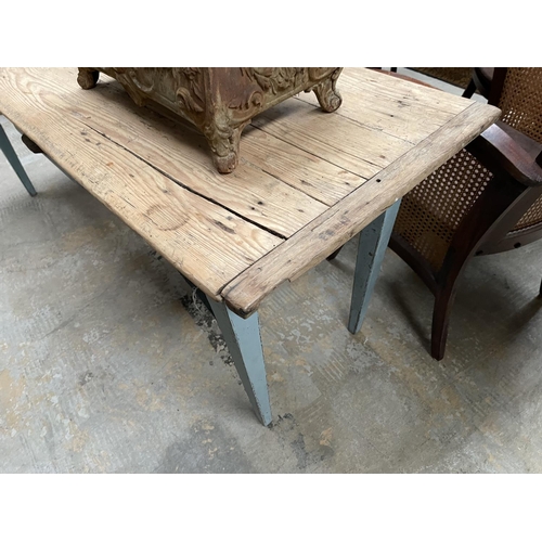 113 - Antique French country long two drawer table, stripped pine top on a pale blue milk painted base, on... 