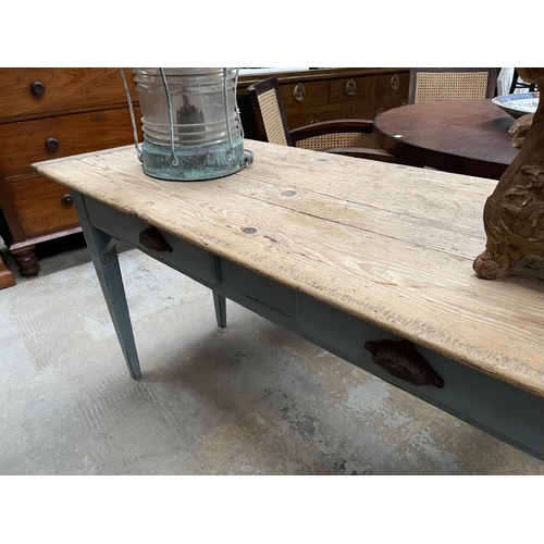 113 - Antique French country long two drawer table, stripped pine top on a pale blue milk painted base, on... 