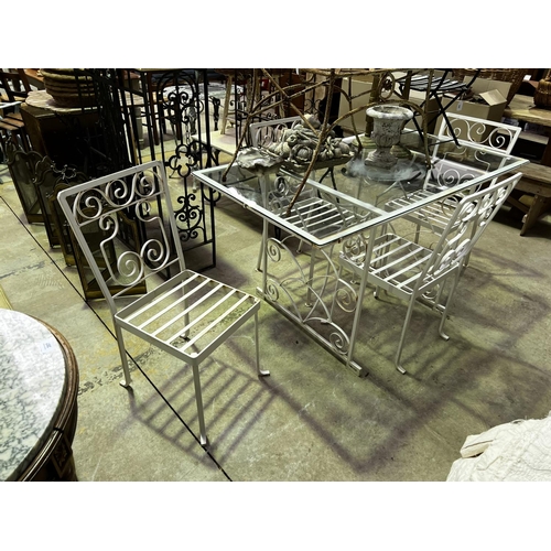 136 - Vintage iron white painted patio suite, comprising a glass topped table and four chairs table, appro... 