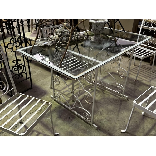 136 - Vintage iron white painted patio suite, comprising a glass topped table and four chairs table, appro... 