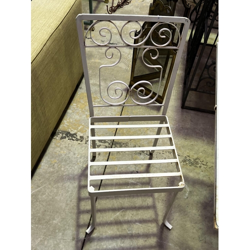 136 - Vintage iron white painted patio suite, comprising a glass topped table and four chairs table, appro... 