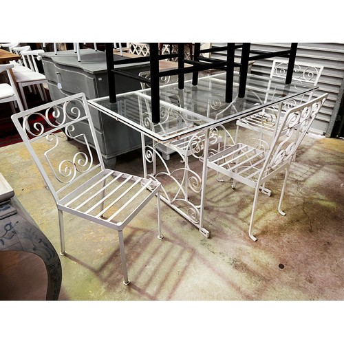 136 - Vintage iron white painted patio suite, comprising a glass topped table and four chairs table, appro... 