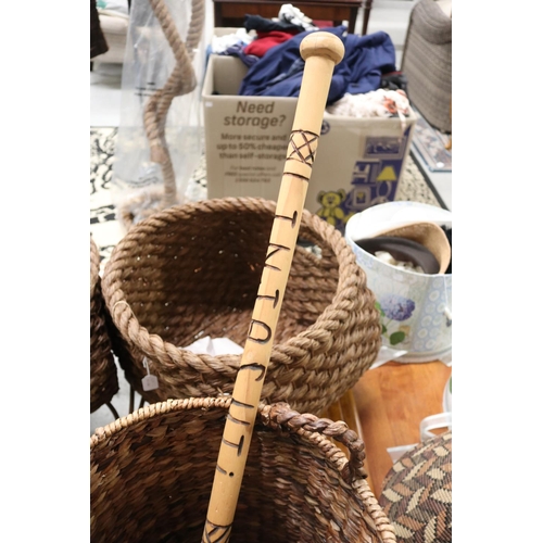 51 - Circular woven basket along with wooden walking stick marked Injasuti, basket approx 45cm H (ex hand... 