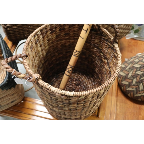 51 - Circular woven basket along with wooden walking stick marked Injasuti, basket approx 45cm H (ex hand... 