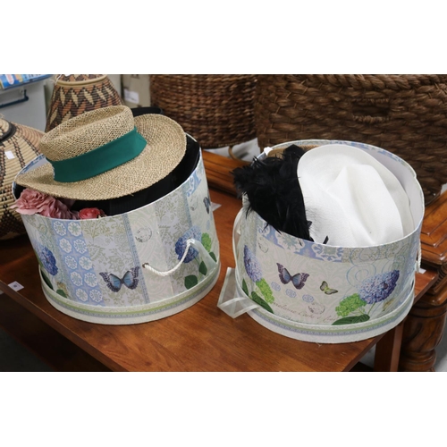 56 - Generous lot of hats with two hat boxes