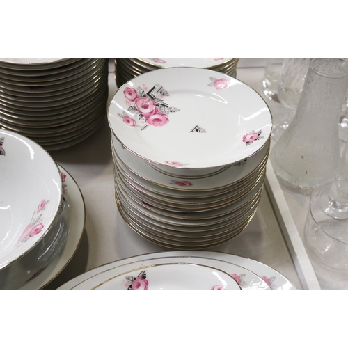 180 - Extensive French Art Deco porcelain dinner service decorated with pink and black flowers