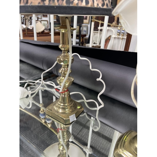 188 - Two brass candlesticks made into lamps, unknown working condition, approx 44cm H and shorter (2)