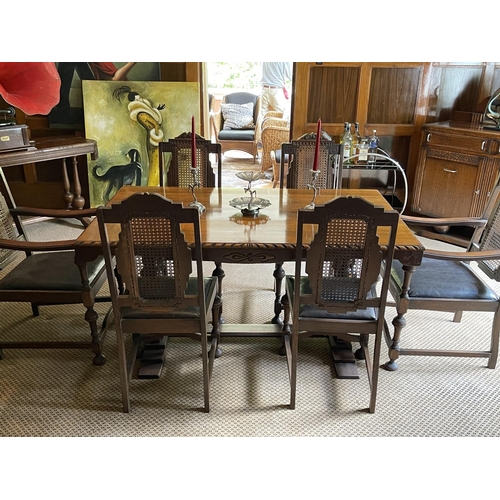 220 - Jacobean revival period oak dining suite, comprising a table and six chairs, chairs with angular can... 