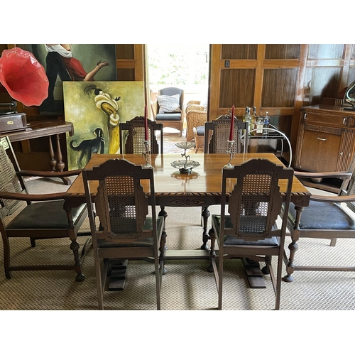 220 - Jacobean revival period oak dining suite, comprising a table and six chairs, chairs with angular can... 