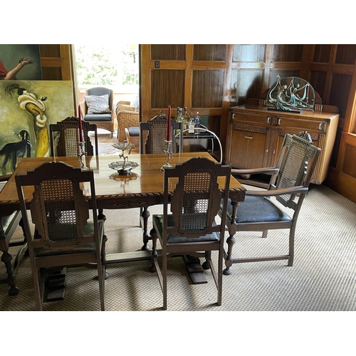 220 - Jacobean revival period oak dining suite, comprising a table and six chairs, chairs with angular can... 