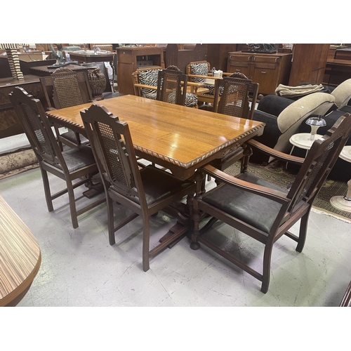 220 - Jacobean revival period oak dining suite, comprising a table and six chairs, chairs with angular can... 