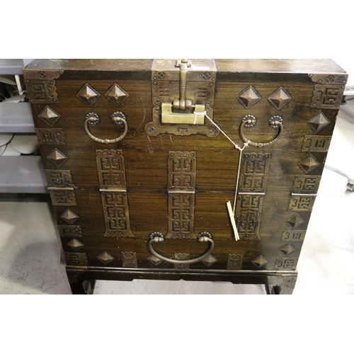 244 - Oriental storage cabinet, pierced brass mounts, locking mechanism with replacement key, approx 83cm ... 