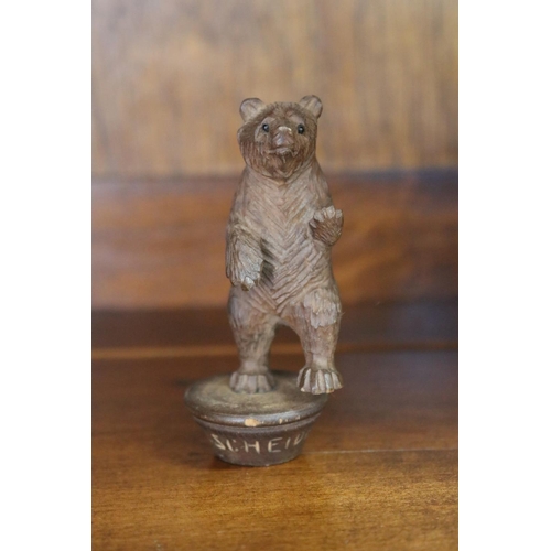 68 - Three carved wooden bears, two holding bowls, one signed KL. Scheidegg, approx 11cm H x 11cm W and s... 