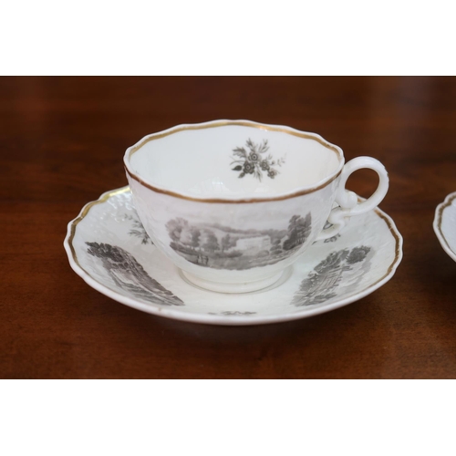 95 - Pair of antique porcelain cups & saucers, decorated with panelled scenes to either side, unmarked bu... 