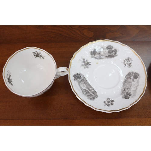 95 - Pair of antique porcelain cups & saucers, decorated with panelled scenes to either side, unmarked bu... 