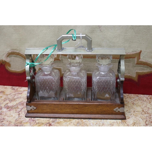 119 - Antique three bottle tantalus, approx 28cm H x 34cm W x 13cm D