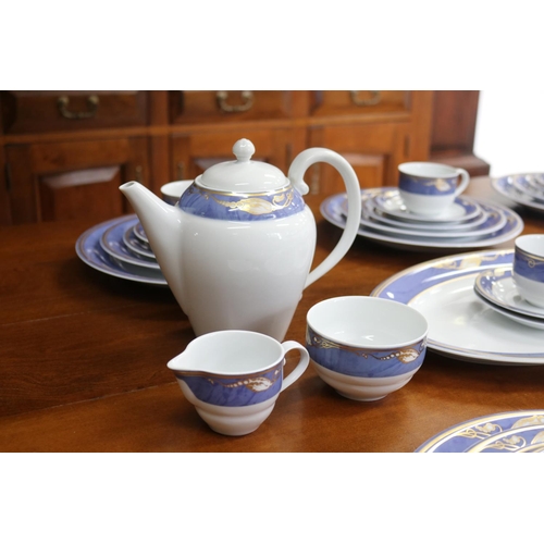 65 - Royal Copenhagen blue magnolia porcelain dinner service for eight and extras, two side plates has ch... 