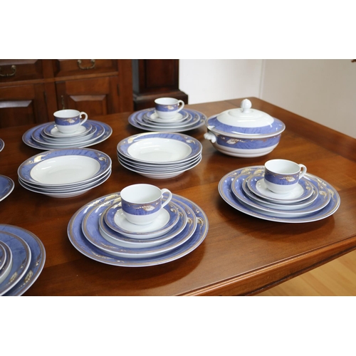 65 - Royal Copenhagen blue magnolia porcelain dinner service for eight and extras, two side plates has ch... 