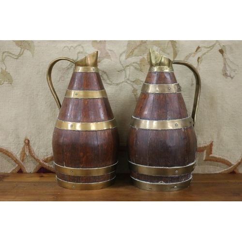 47 - Rare pair of antique French wooden staved pitchers with brass banding, each approx 30cm H (2)