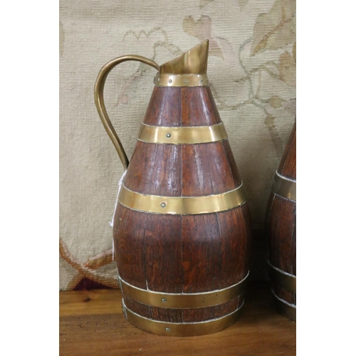 47 - Rare pair of antique French wooden staved pitchers with brass banding, each approx 30cm H (2)