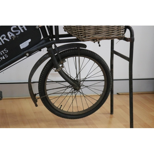 7 - Vintage English Mansfield delivery bicycle, with sign mounted to frame, & old woven basket to front,... 
