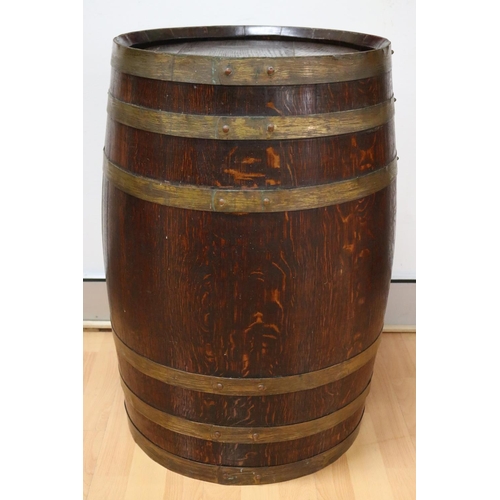 60 - Large English oak barrel with brass banding, approx 71cm H x 46cm dia
