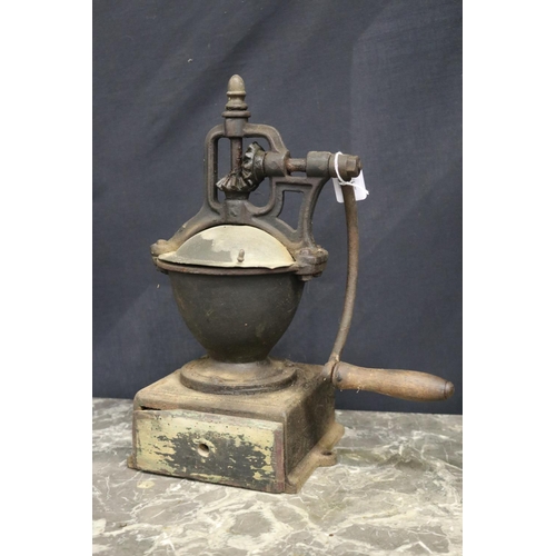 7 - Antique French cast iron grinder, approx 37cm H