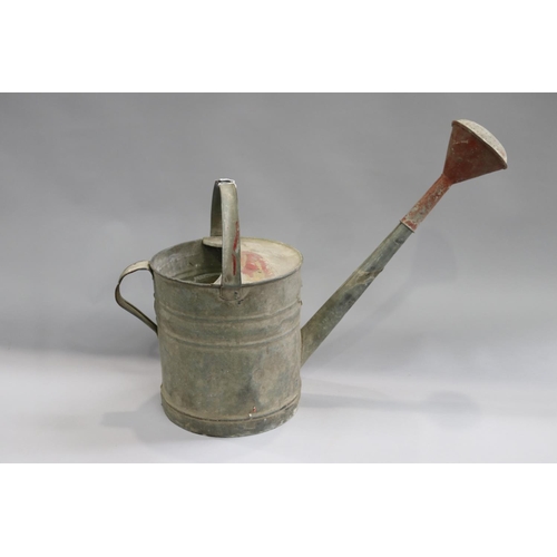 140 - Antique gal metal watering can with rose, approx 49cm H x 65cm W