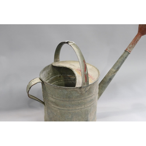 140 - Antique gal metal watering can with rose, approx 49cm H x 65cm W