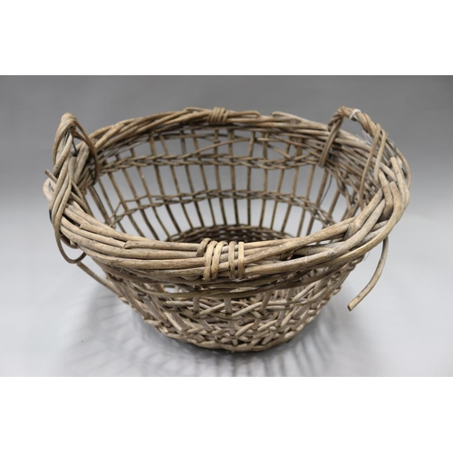 89 - Rustic twin handled basket, approx 37cm H (ex handles) x 61cm W x 56cm D