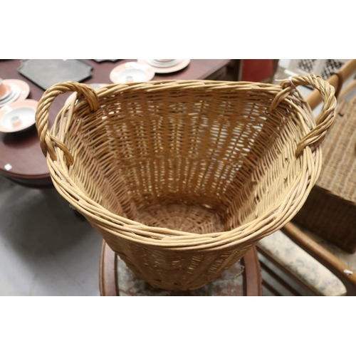 272 - Twin handled cane basket, approx 37cm H ex handles x 43cm W x 33cm D