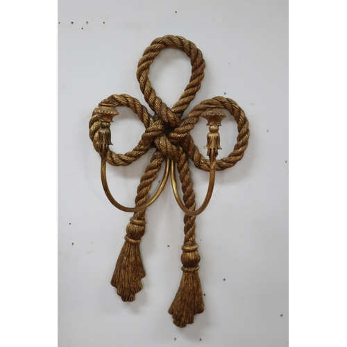 1085 - Pair of decorative faux rope tied two stick appliques, each approx 64cm H (2)