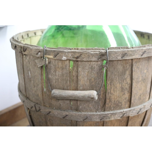 1123 - French green glass bottle bentwood cradle, approx 53cm H x 44cm Dia