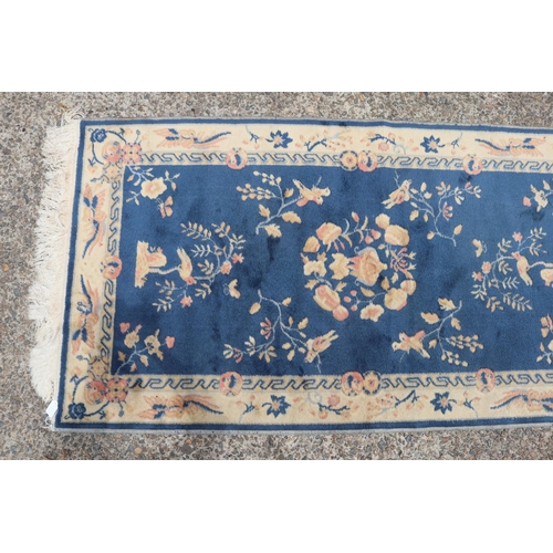 1135 - Chinese wool carpet, approx 85cm x 156cm