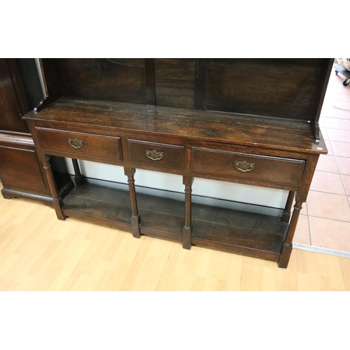 1604 - Antique English 18th century revival oak pot board dresser, fitted with three drawers, with turned b... 