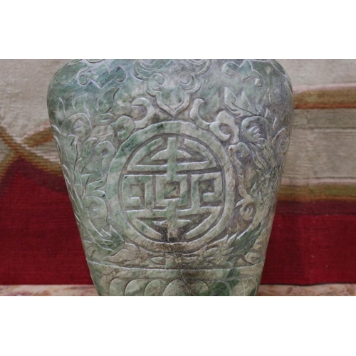 1758 - Chinese archaistic rustic green jade vase, carved in low relief, showing signs of natural cracking, ... 