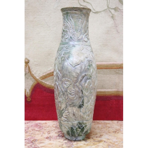 1758 - Chinese archaistic rustic green jade vase, carved in low relief, showing signs of natural cracking, ... 