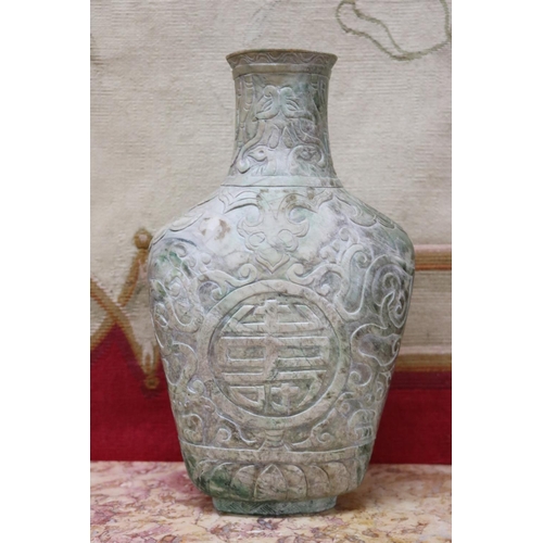 1758 - Chinese archaistic rustic green jade vase, carved in low relief, showing signs of natural cracking, ... 