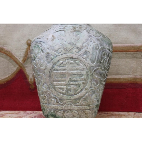 1758 - Chinese archaistic rustic green jade vase, carved in low relief, showing signs of natural cracking, ... 