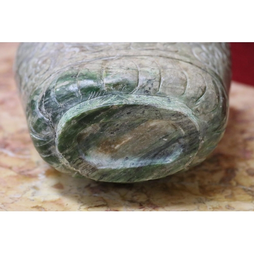 1758 - Chinese archaistic rustic green jade vase, carved in low relief, showing signs of natural cracking, ... 