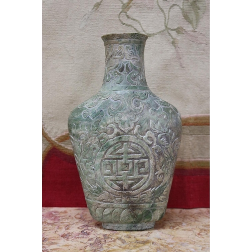 1758 - Chinese archaistic rustic green jade vase, carved in low relief, showing signs of natural cracking, ... 