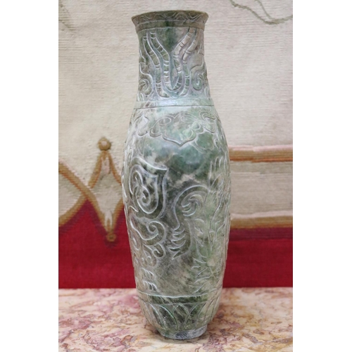 1758 - Chinese archaistic rustic green jade vase, carved in low relief, showing signs of natural cracking, ... 