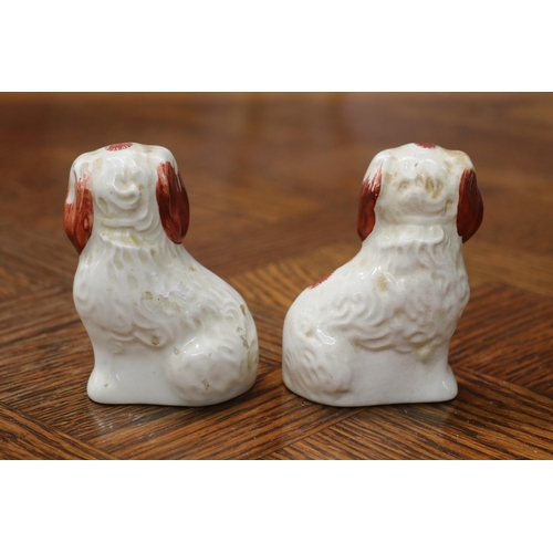 1616 - Pair of Beswick porcelain dogs, each approx 9cm H  (2)